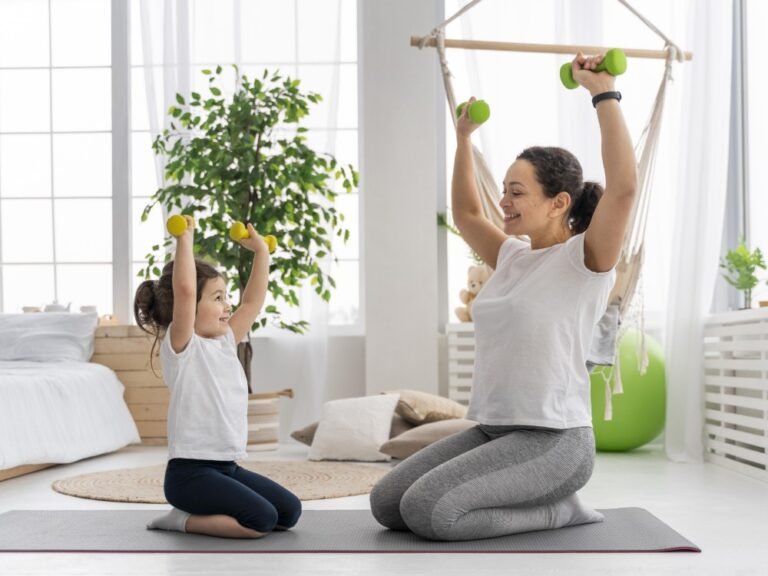 full-shot-adult-kid-holding-dumbbells