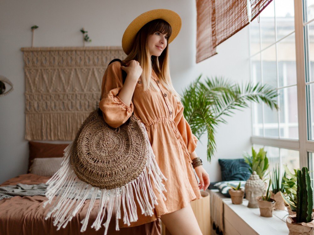 woman linen dress chilling home looking window